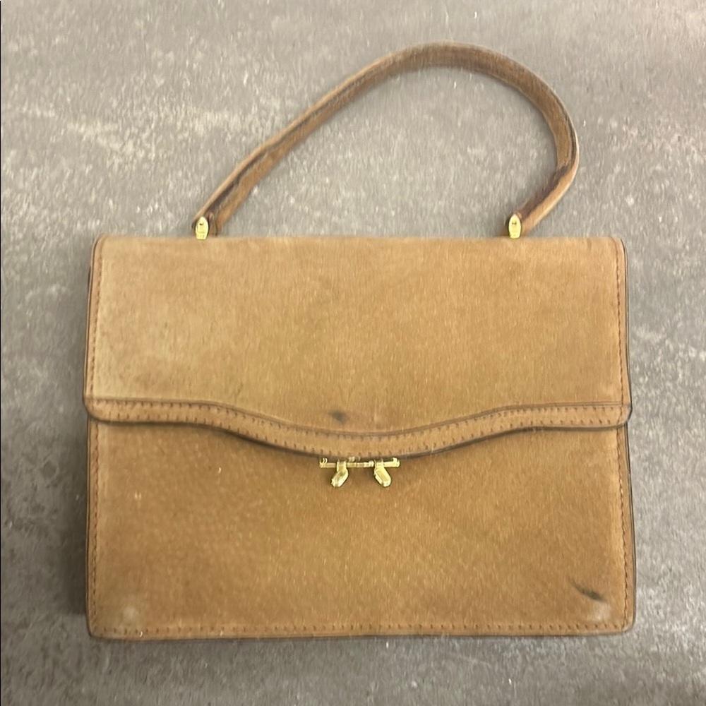 Vintage 1970s suede arm bag madmen